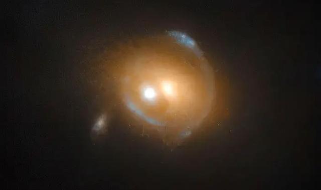 引力透镜和类星体：测量星系质量的新方法